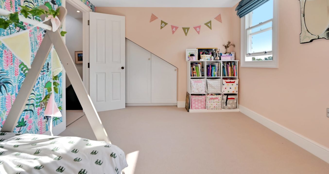 lovely kids bedroom in a Hip to Gable & Dormer loft conversion at a home in Teddington Middlesex