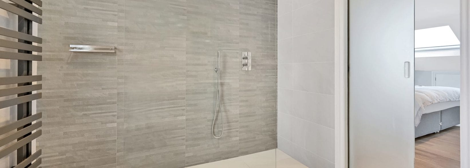 large walk in shower in an L-Shaped Dormer, at a home in Norwood South East London, SE27