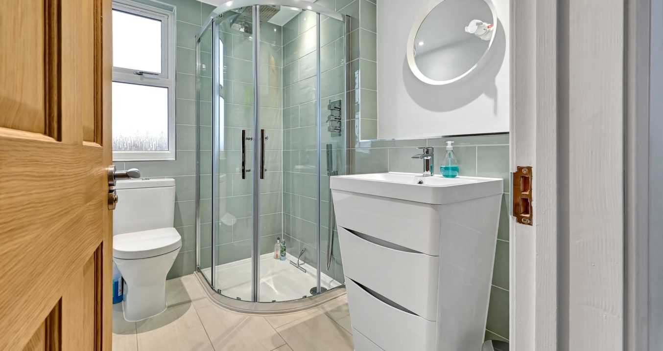shower room with velux windows in an L-Shaped dormer loft conversion in Sydenham South East London, SE26.