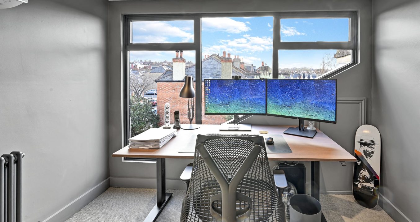 home office with desk in L-Shaped Dormer loft conversion, at a home in Lewisham South East London, SE4