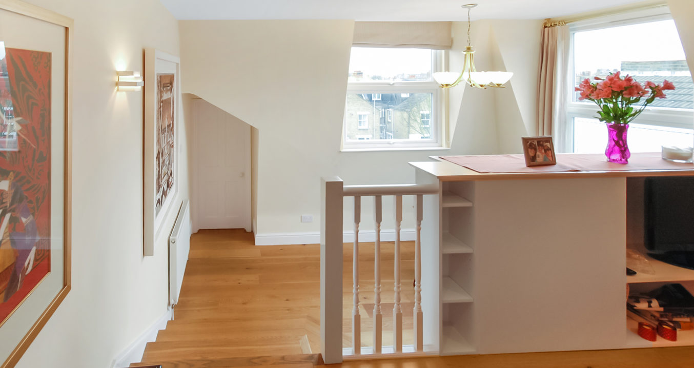 L-Shaped Mansard loft conversion, creating a spacious living area at a home in Southfields South West London, SW18