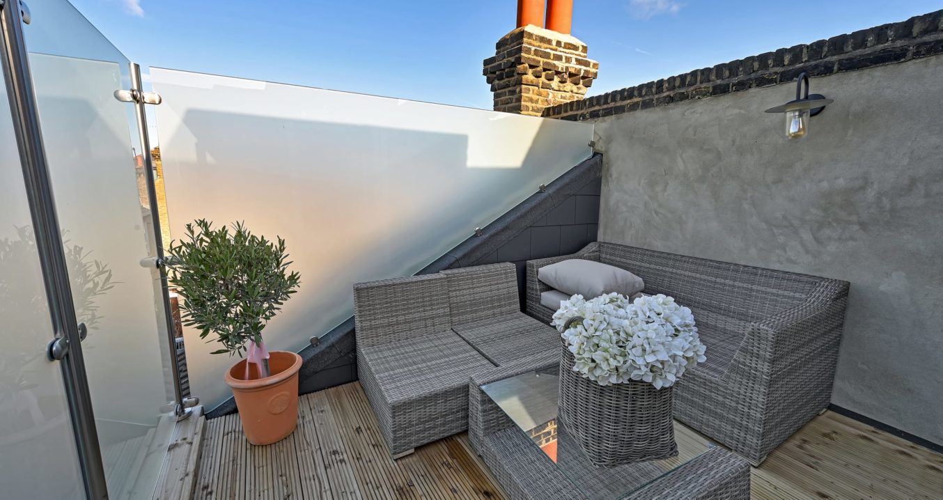 lovely terrace, part of an L-Shaped Mansard loft conversion at a home in Tooting South West London, SW1