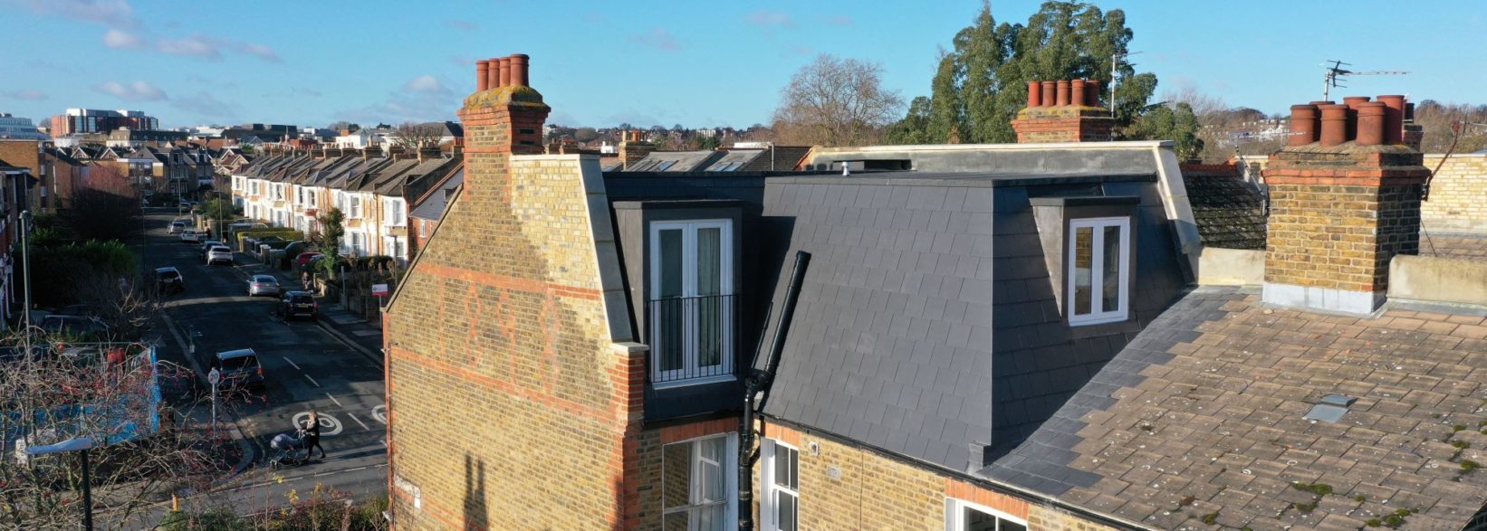Aerial view of L Shaped Mansard loft conversion in Chingford, E4, East London, roof and Juliet balcony