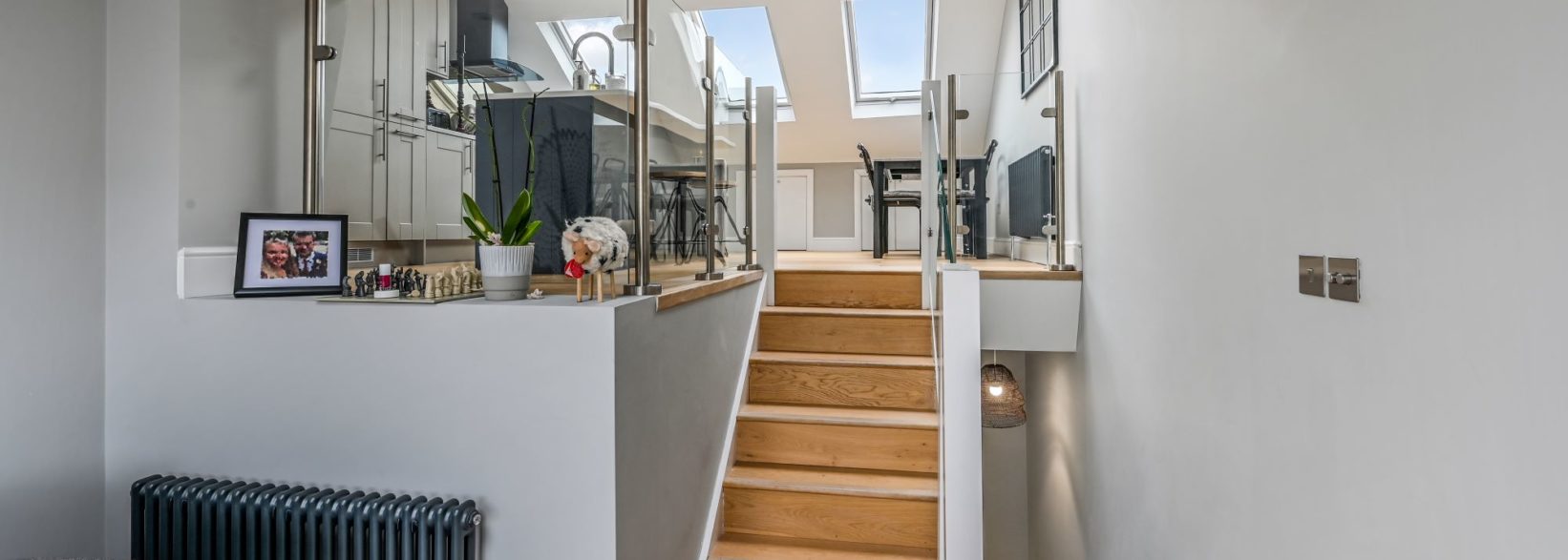 Modern Frameless Glass Staircase in L-Shaped Dormer Loft Conversion in Crouch End, North London N8