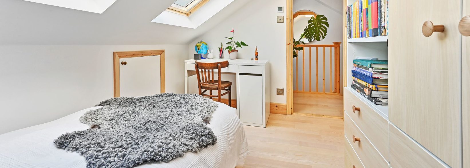 Light and airy kids room with velux windows in Islington N1 loft conversion project