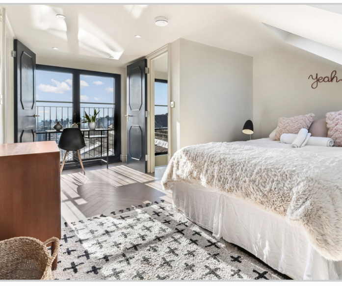 A contemporary bedroom, bathroom and living space. Loft conversions that are light and natural Hertford