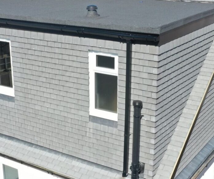 Hip to gable loft conversion exterior Dulwich SE22 with grey slates