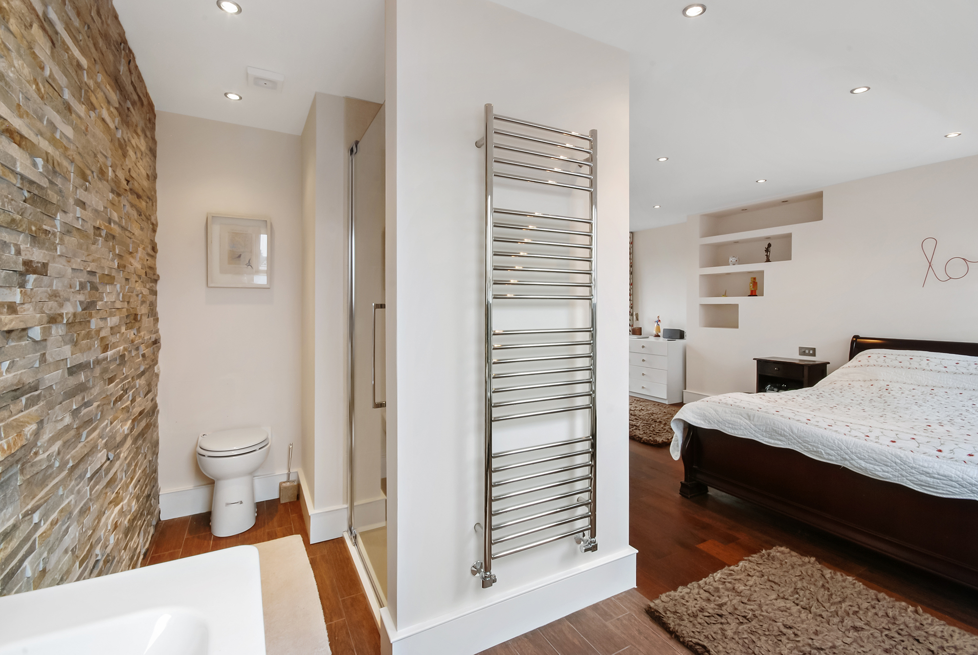 En suite shower room connected to a Borehamwood loft conversion master bedroom