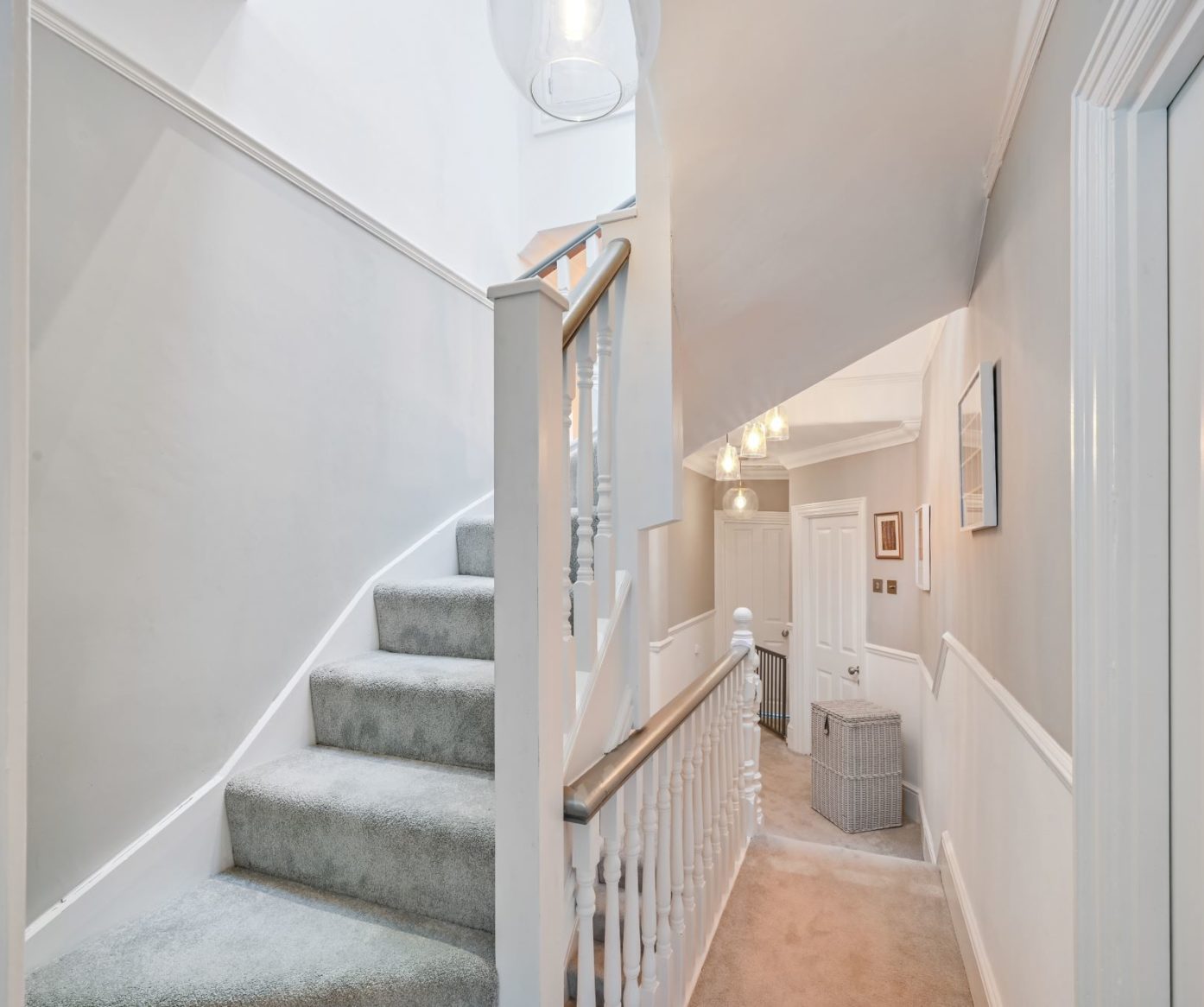 Bright new staircase and landing created during a loft conversion in Barnet North London