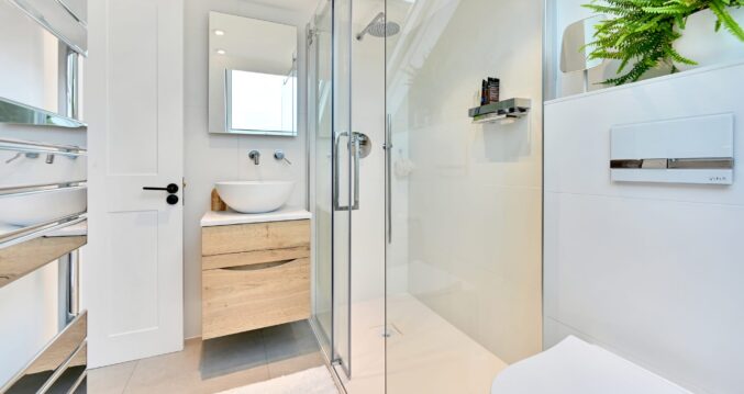 Dormer loft shower room with walk in shower and timber vanity for a Plumstead SE18 home