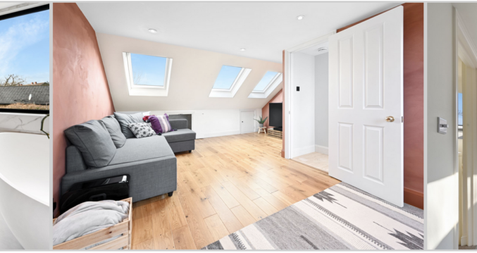 Open loft living space with rooflights, sofa area, timber flooring and bedroom area, supporting Crystal Palace loft conversion content.